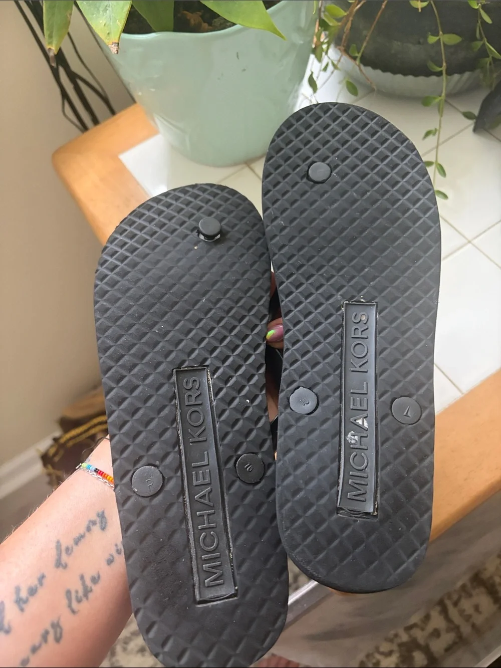 Michael Kors Black Logo Print Girls' Flip Flops with Silver MK Medallion